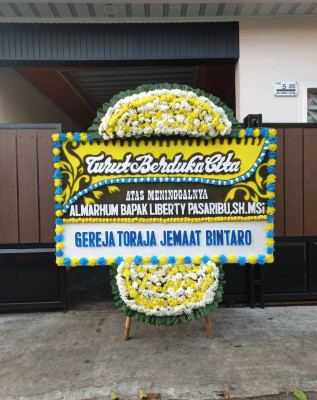 Papan Bunga Duka di Olak Kemang